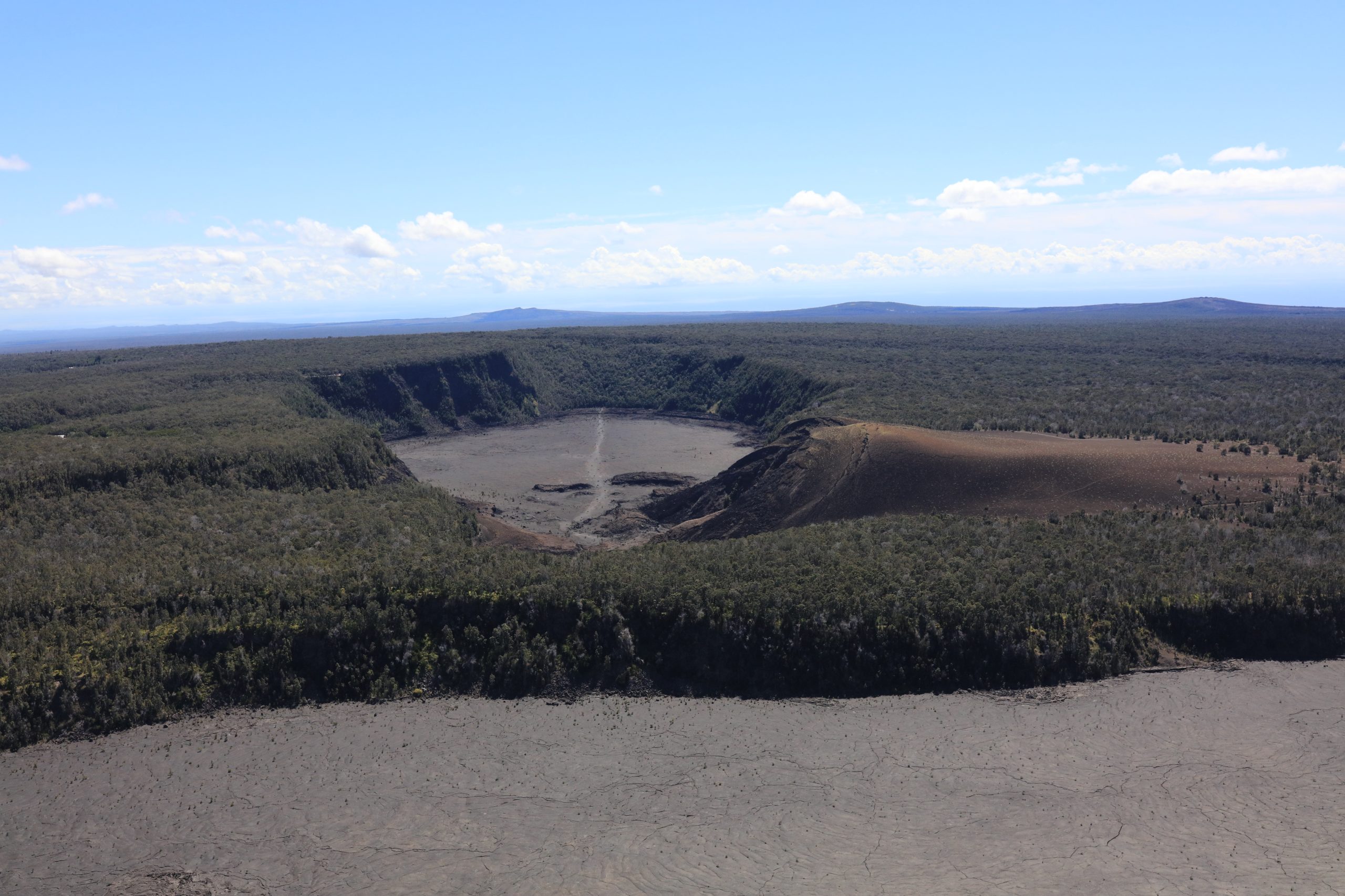 Hawaii Volcanoes National Park — the $30 vehicle entry covers all trails, overlooks, Chain of Craters Road (19 miles), ranger programs, and eruption viewing; children 15 and under are always free